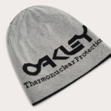 Bonnet Oakley TNP Reversible - noir | Oxmoto