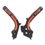 Protections de cadre Racetech bi-matières orange/noir R-PRTKTMNRAR1