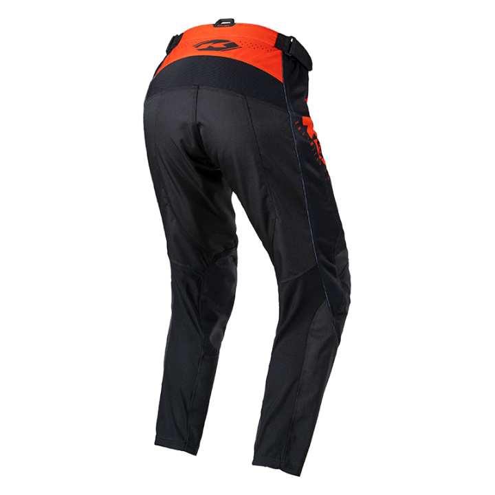Pantalon enfant KENNY track focus noir/orange 2025 | Oxmoto